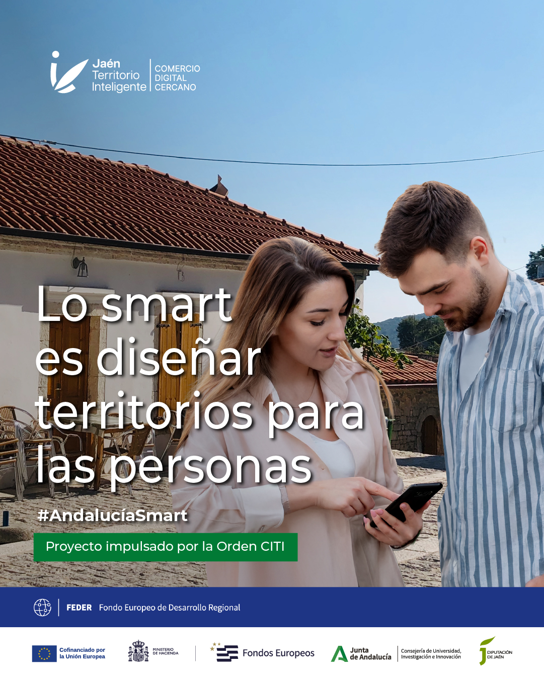 Un hombre y una mujer miran un móvil en una calle empedrada con casas de teja, junto a un texto sobre territorios smart.